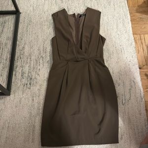 Brown deep v sleeveless dress.